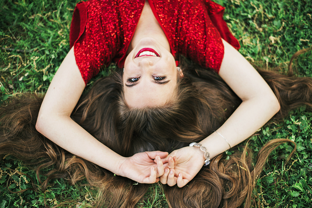 Michigan Senior Portraits - Senior Laying on the Ground