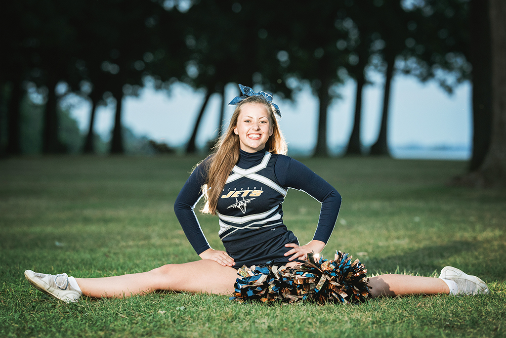 Michigan Senior Portraits - High School Senior Girl in Cheerleading Squad and Outfit